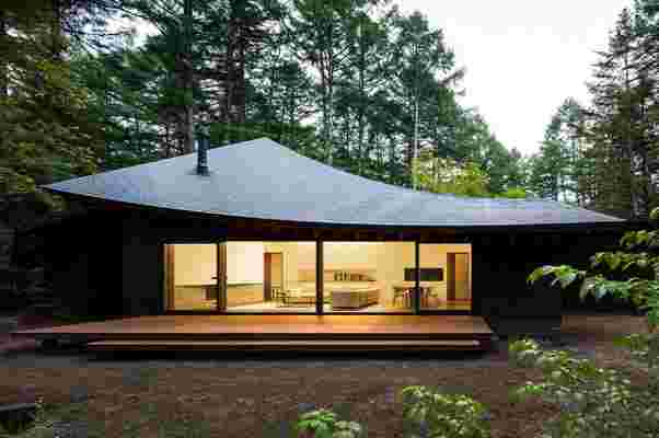 This Japanese-inspired residence features a multi-tiered, sloping roof that mimics the gentle curve of fallen leaves!