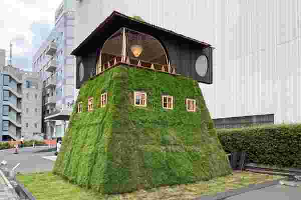 This Japanese architect’s fairytale teahouse covered in a grassy facade is topped with a yakisugi-treated timber loft!