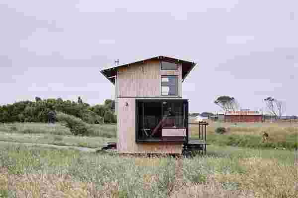 This tiny passive home saves and creates space with an expandable roof and multifunctional furniture!